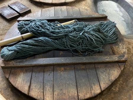Indigo-dyed yarn at Yamamura Takeshi Textile Atelier, founded in 1891, that still makes hand-woven kasuri fabric